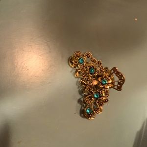 Beautiful gold tone with green stones hair comb unpackaged but never used